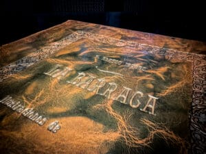 Close-up archival image of a leather-bound edition of La Barraca by Vicente Blasco Ibáñez (Vicente Blasco Ibanez), featuring embossed typography and decorative borders on aged brown leather. The photograph highlights material craftsmanship, wear, and patina consistent with early twentieth-century bindings. This item forms part of an academic archive documenting canonical novels of Spanish realism and Blasco Ibáñez’s enduring literary legacy.